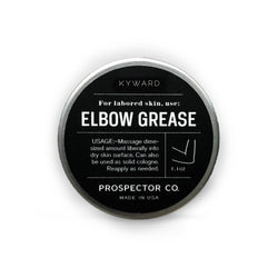 A circular metal tin of product with silver cap and black-colored ingredients label.
