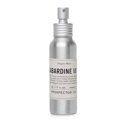 A metal spray bottle of product with silver cap and cream-colored ingredients label.